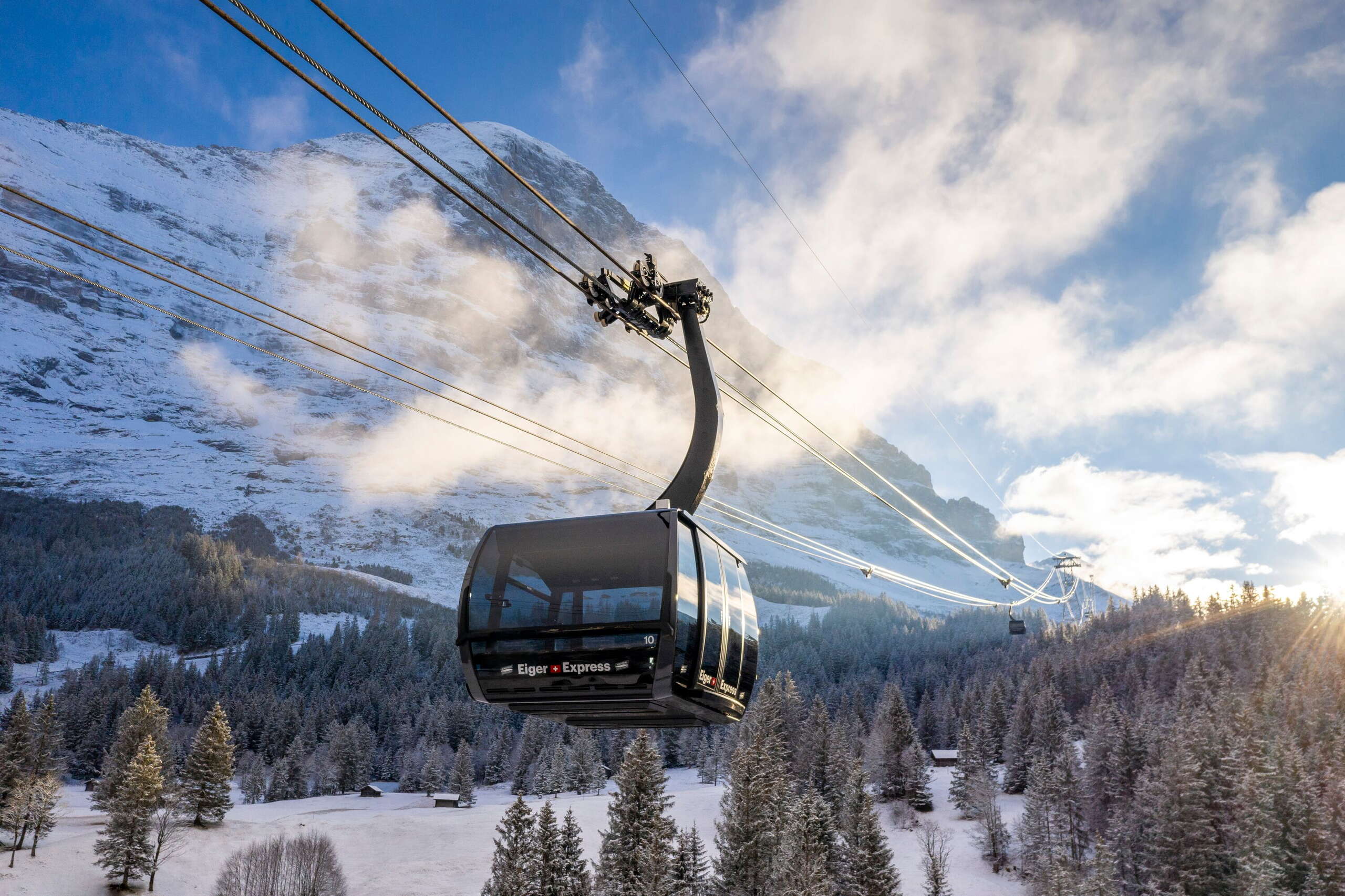 The Eiger Express on its way between Grindelwald and the Eiger Glacier. The most modern tricable gondola in the world is part of the V-Cableway.