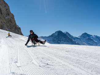 Schlitten Big Pintenfritz. Die Strecke führt von der First - Faulhorn - Bussalp. Und bietet eine imposante Panoramasicht auf den Eiger und dazugehörige Bergkette.