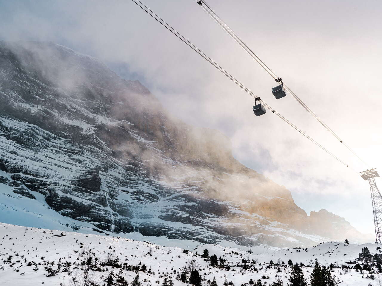 The Eiger Express on its way between Grindelwald and the Eiger Glacier. The most modern tricable gondola in the world is part of the V-Cableway.